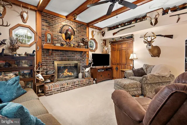 a kitchen with stainless steel appliances granite countertop a sink dishwasher a stove and a microwave oven with granite countertops