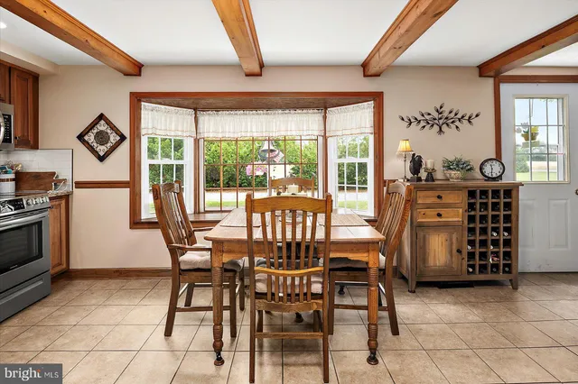 a bathroom with a sink toilet and mirror