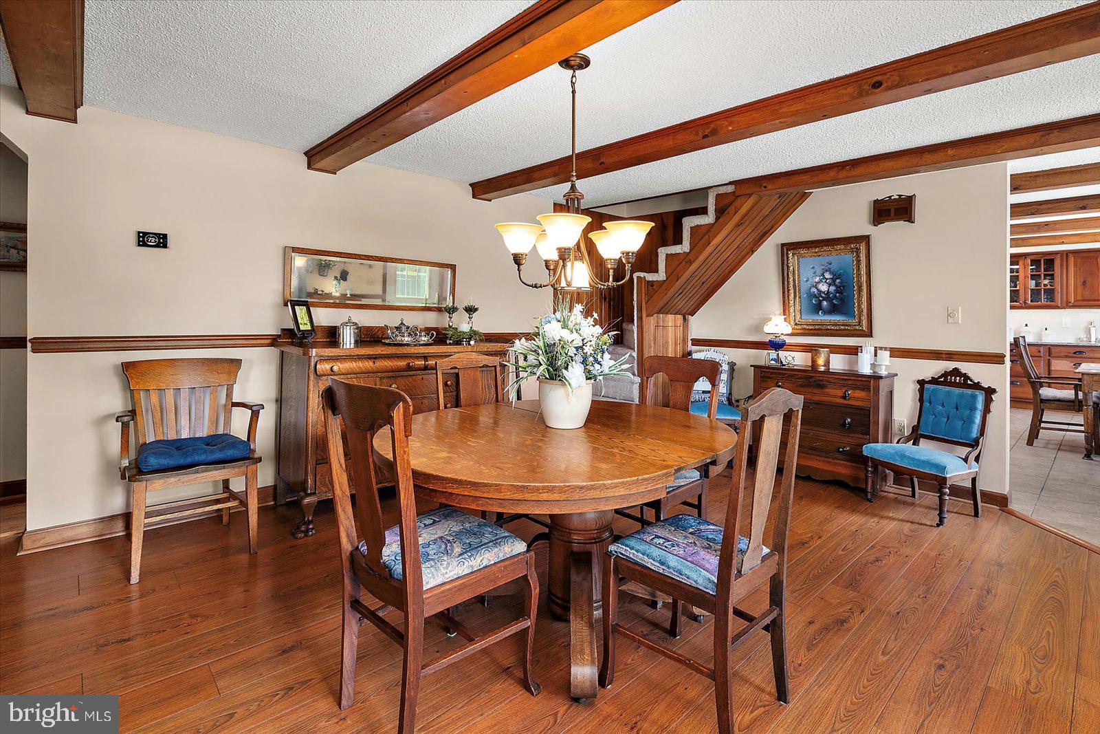 8807 Woodland Ferry Road Laurel, DE 19956 - Photo 29 of 90 a view of a dining room with furniture and wooden floor
