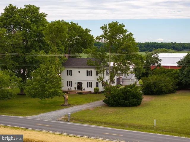 a view of a livingroom with furniture and windows