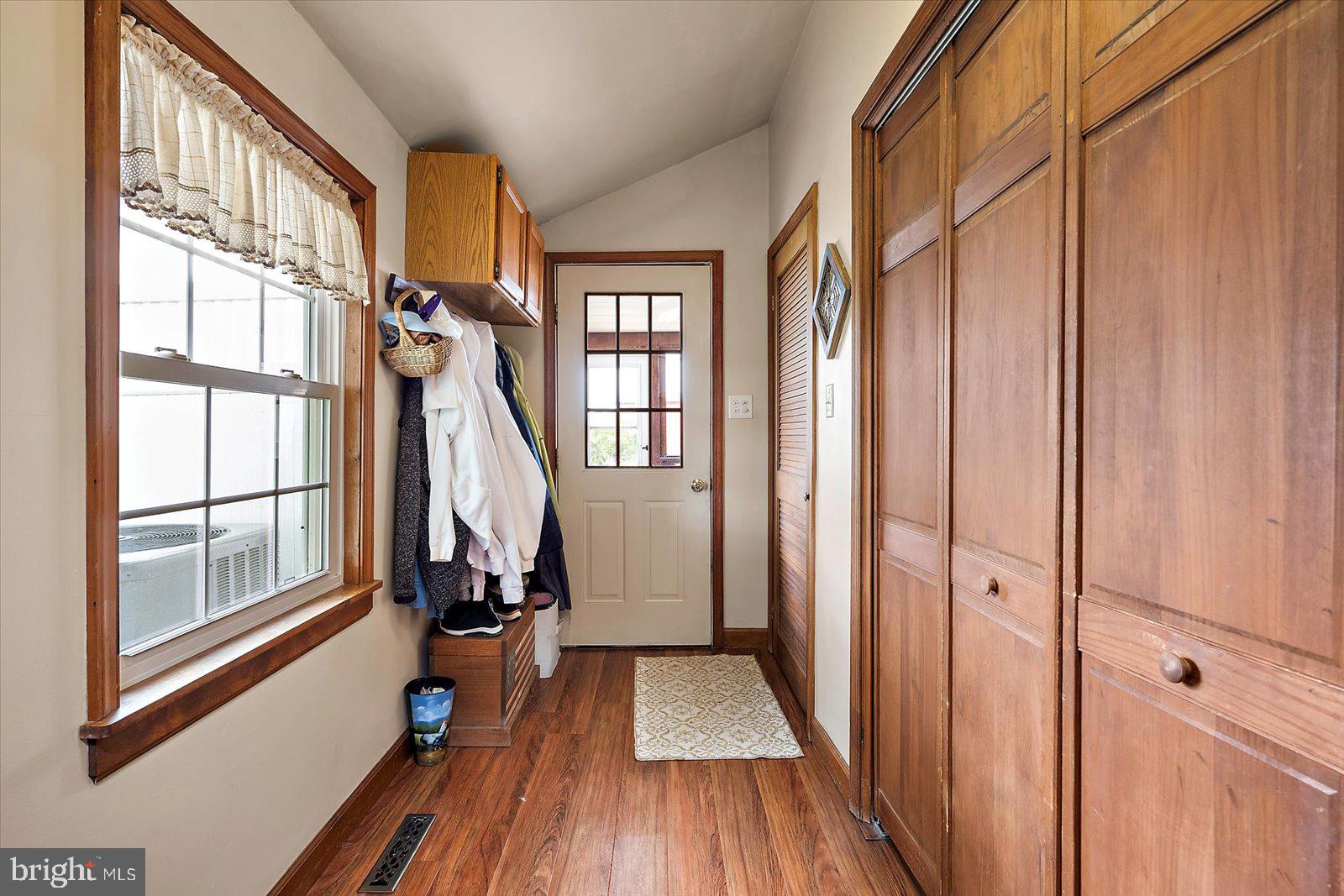 8807 Woodland Ferry Road Laurel, DE 19956 - Photo 57 of 90 a view of an entryway with wooden floor and stairs