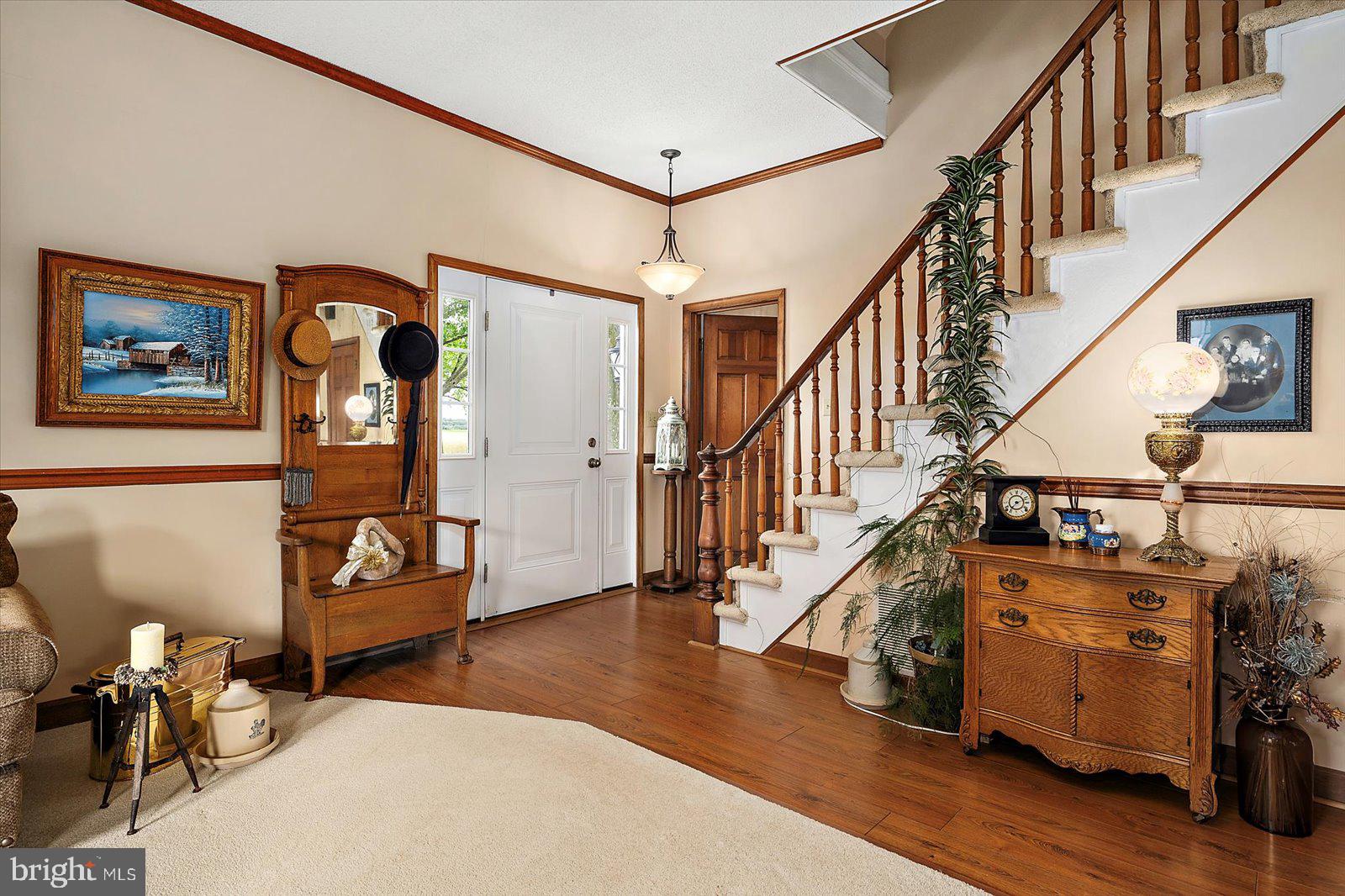 8807 Woodland Ferry Road Laurel, DE 19956 - Photo 6 of 90 Front entry into living room and den