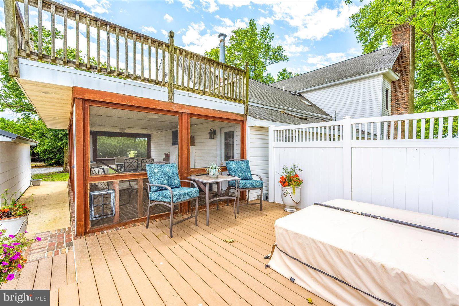 8807 Woodland Ferry Road Laurel, DE 19956 - Photo 62 of 90 Composite decking with hot tub and privacy fence