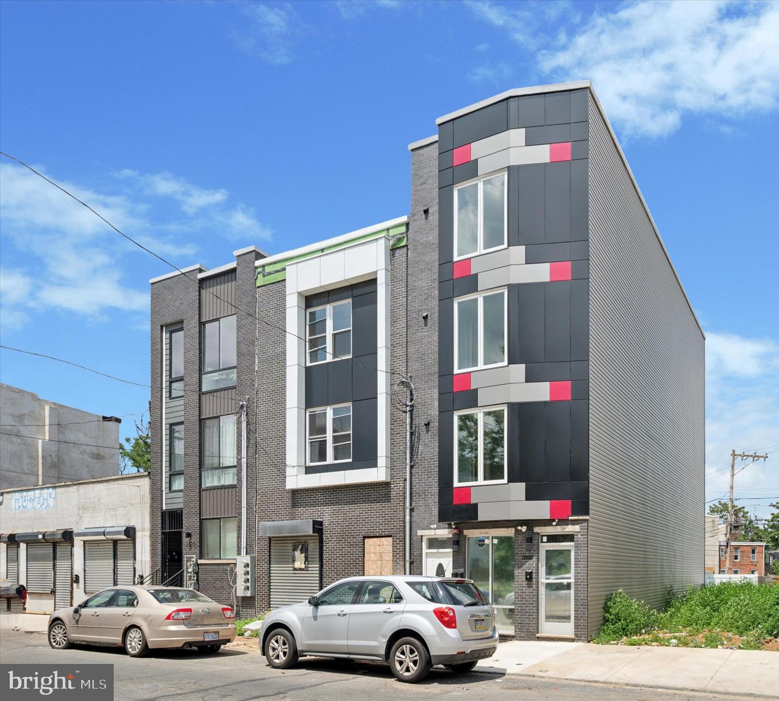 2405 Ridge Avenue, Unit 3 Philadelphia, PA 19121 - Photo 2 of 11 a front view of a building and car parked