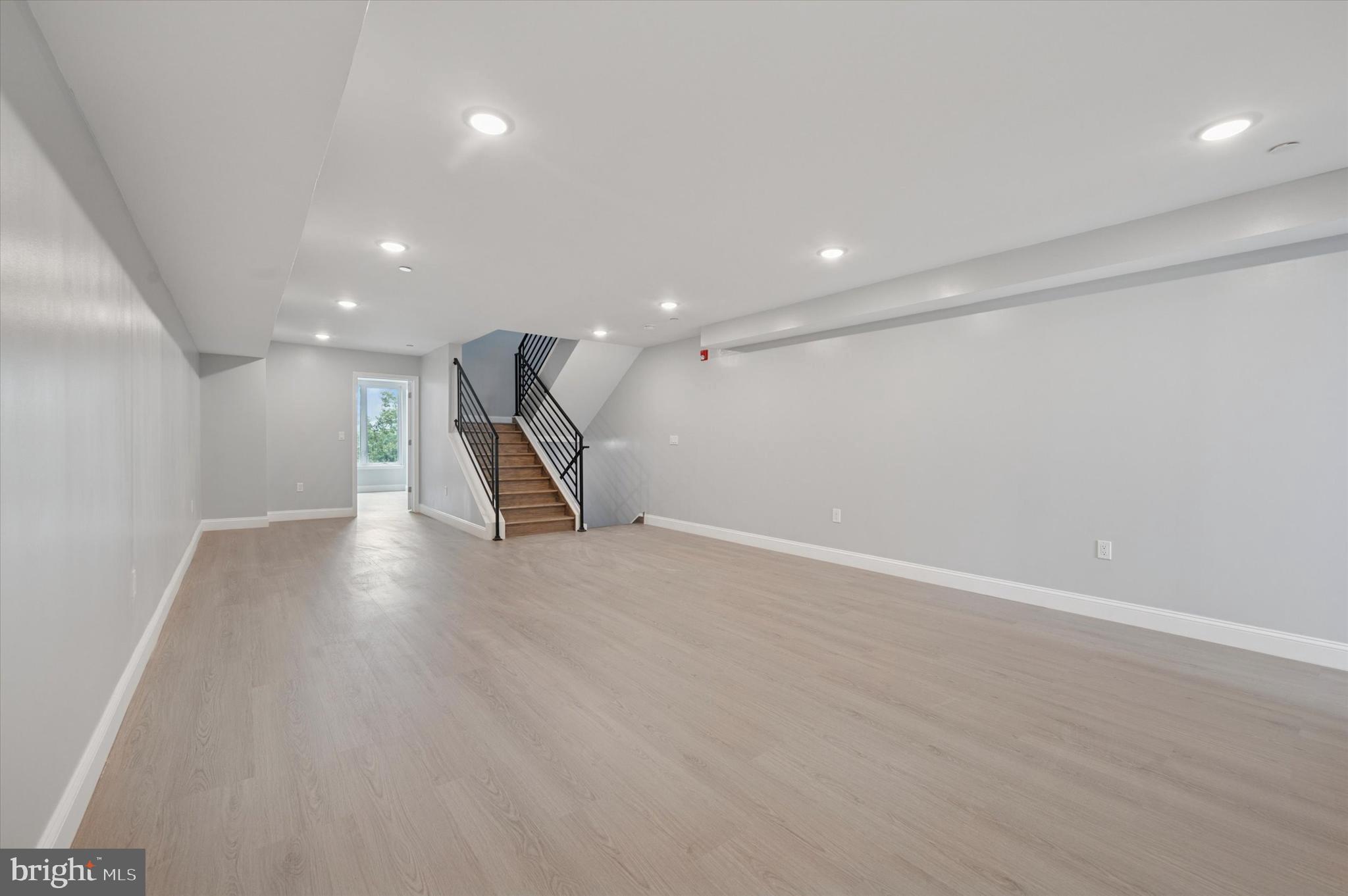 2405 Ridge Avenue, Unit 3 Philadelphia, PA 19121 - Photo 6 of 11 a view of an empty room with wooden floor