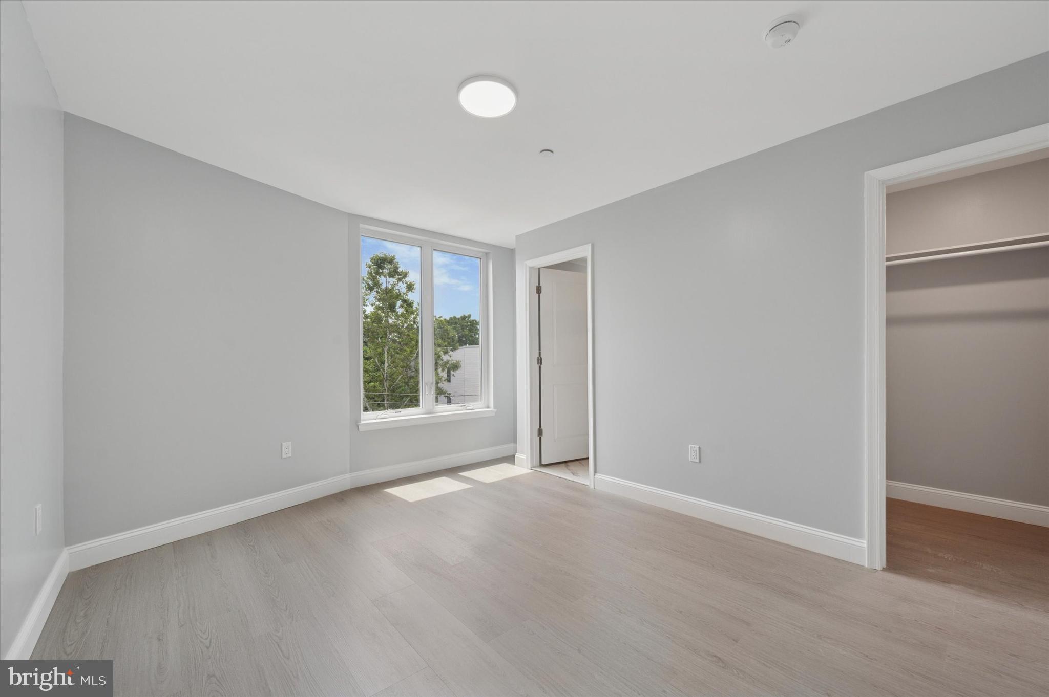 2405 Ridge Avenue, Unit 3 Philadelphia, PA 19121 - Photo 7 of 11 a view of an empty room with a window