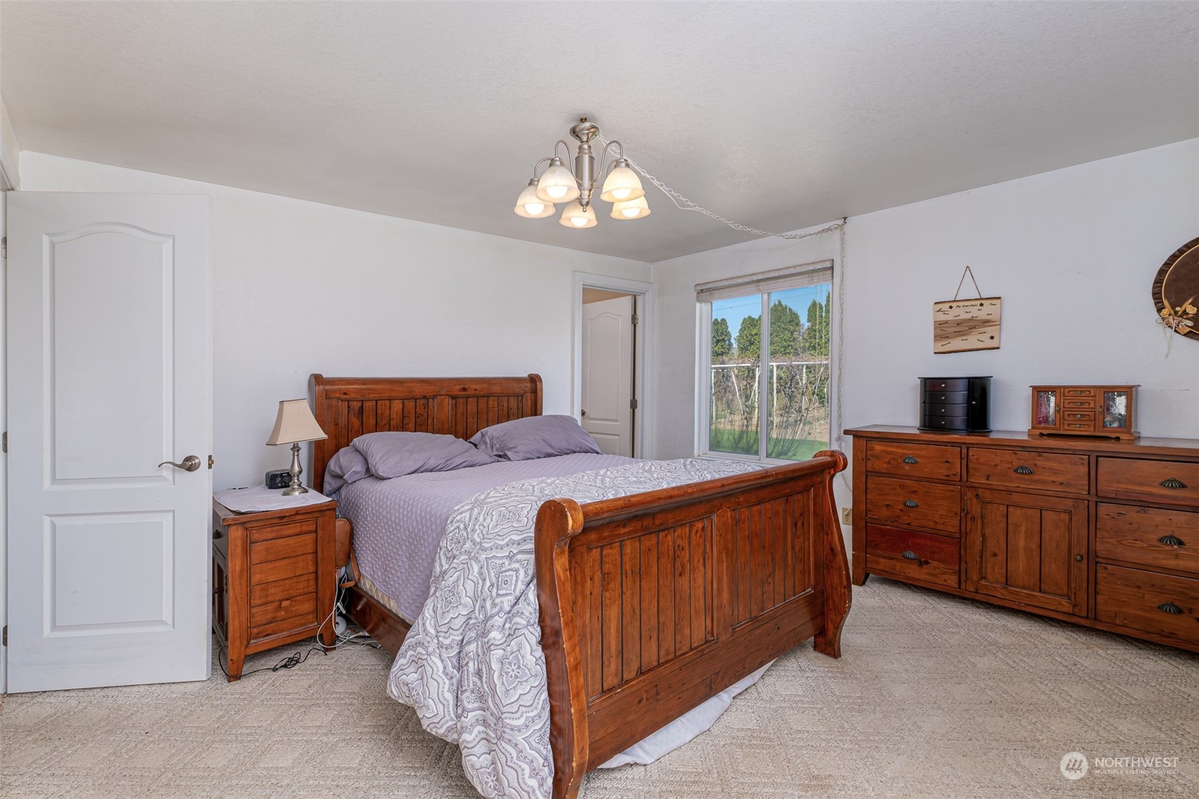10676 13th Road Northwest Quincy, WA 98848 - Photo 14 of 34 a bedroom with a bed and a dresser
