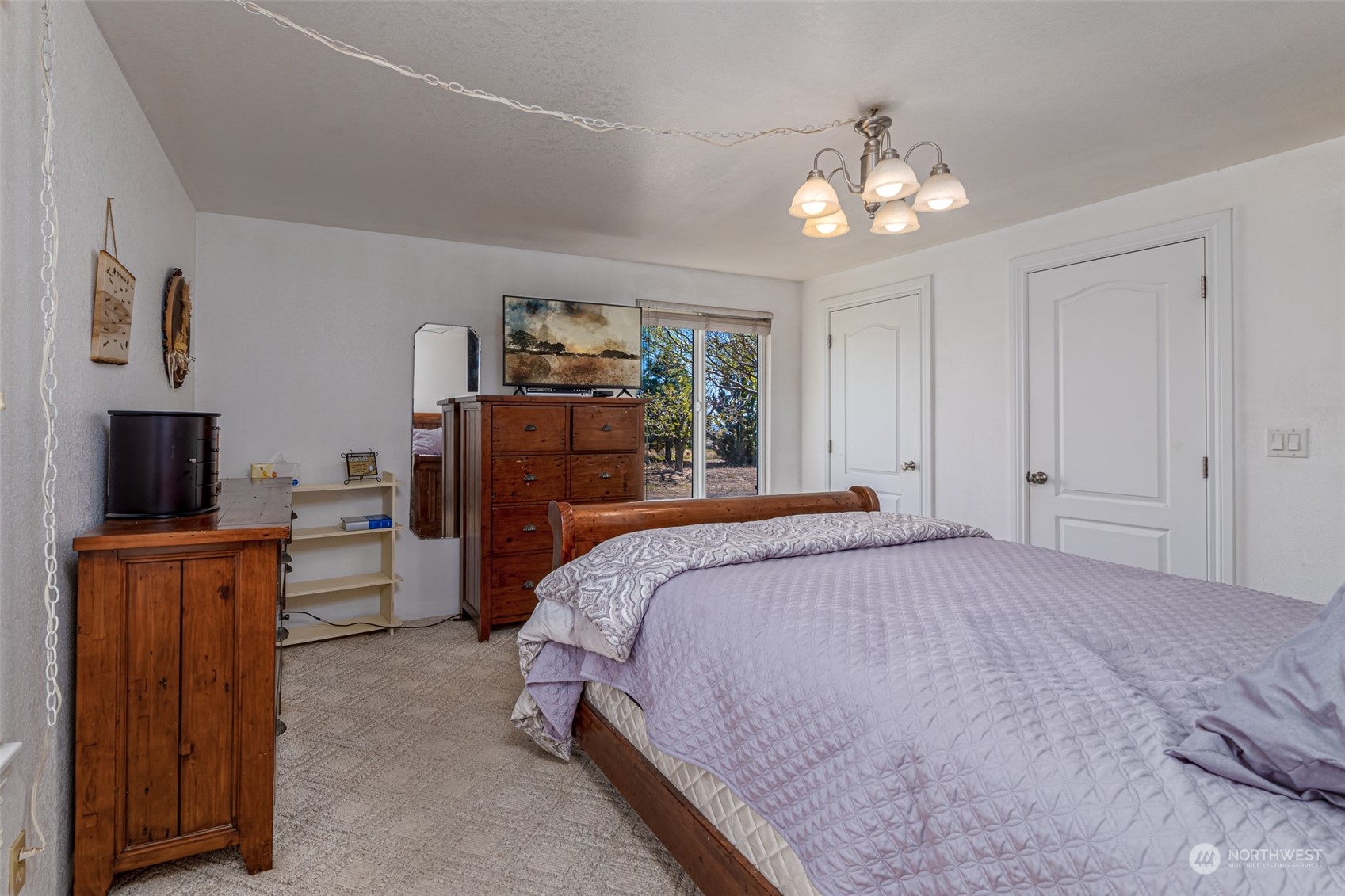 10676 13th Road Northwest Quincy, WA 98848 - Photo 16 of 34 a bed room with a bed and a television