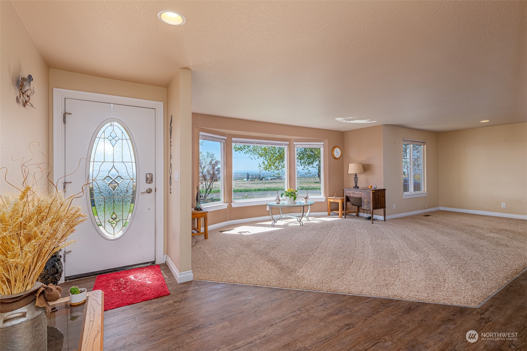10676 13th Road Northwest Quincy, WA 98848 - Photo 2 of 34 a view of a livingroom with furniture wooden floor and a fireplace