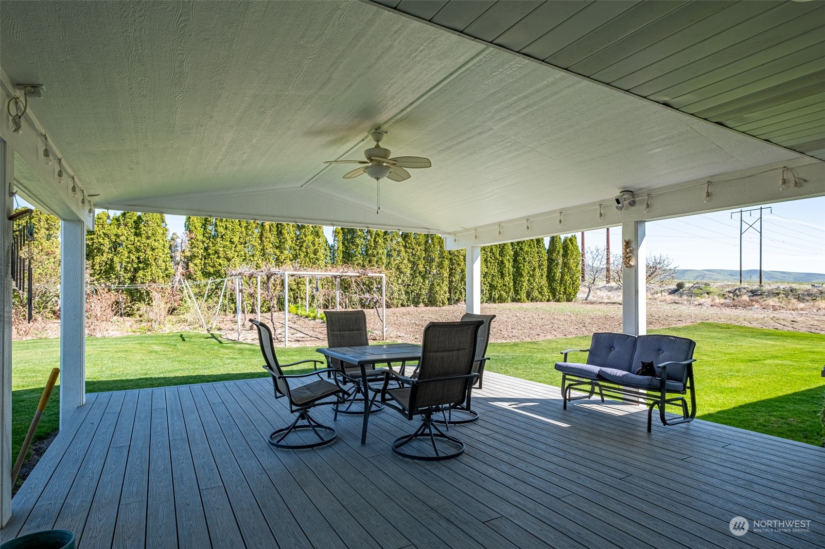 10676 13th Road Northwest Quincy, WA 98848 - Photo 23 of 34 a view of a dining room with furniture window and wooden floor