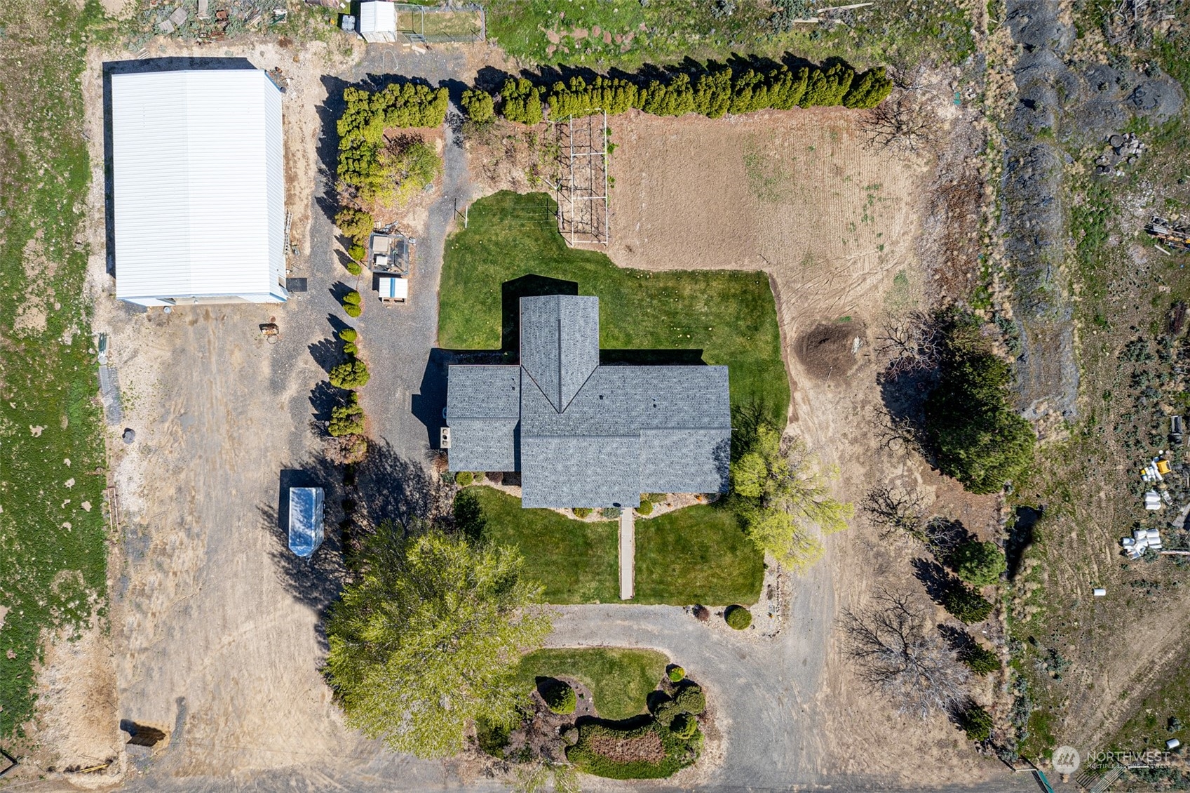 10676 13th Road Northwest Quincy, WA 98848 - Photo 28 of 34 an aerial view of a house with a swimming pool