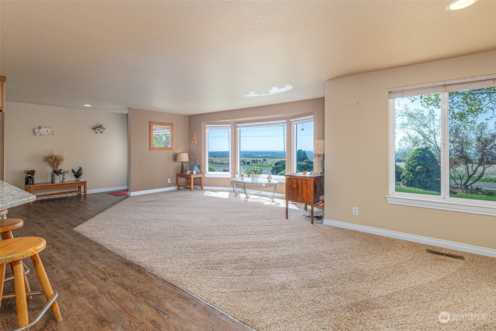 10676 13th Road Northwest Quincy, WA 98848 - Photo 3 of 34 a living room with furniture and a large window