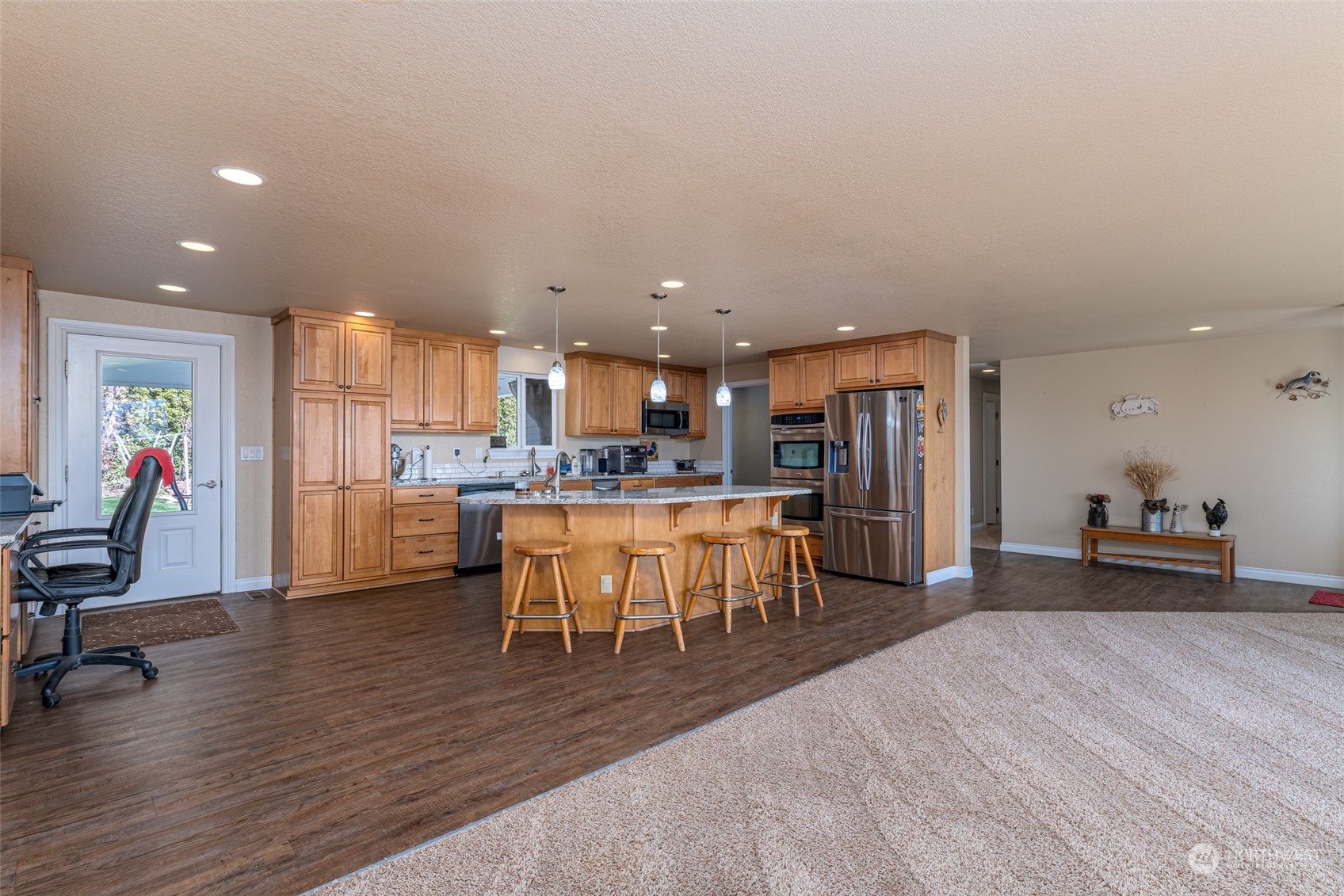 10676 13th Road Northwest Quincy, WA 98848 - Photo 4 of 34 a view of a kitchen and dining room