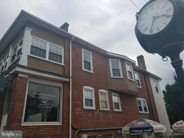 a front view of a house with entertaining space