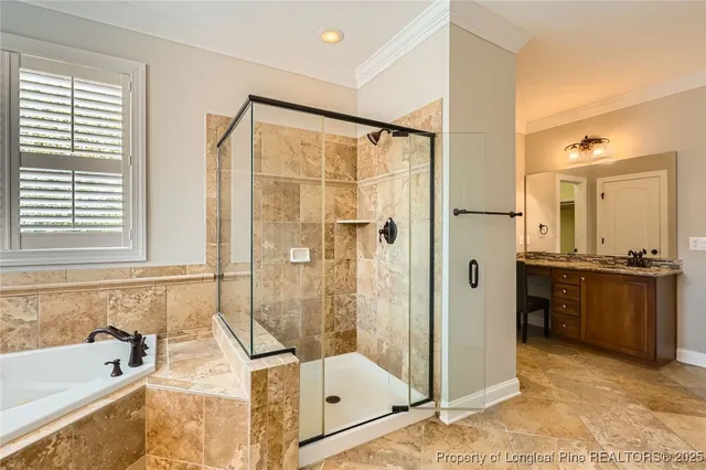 a bathroom with a tub shower and sink