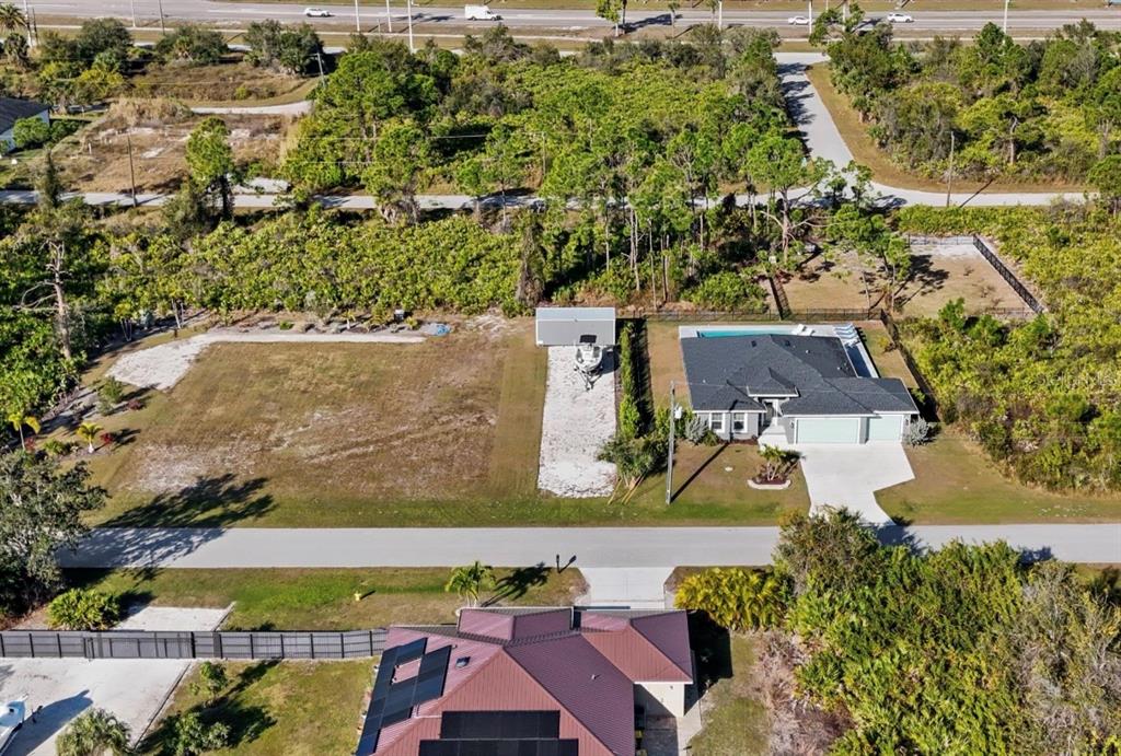 8221 Agate Street Port Charlotte, FL 33981 - Photo 1 of 50 an aerial view of residential houses with outdoor space