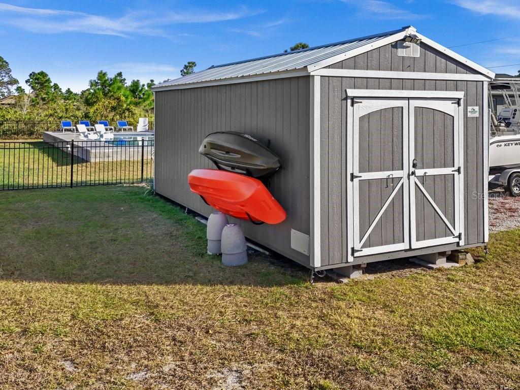 8221 Agate Street Port Charlotte, FL 33981 - Photo 13 of 50 a view of a house with a yard
