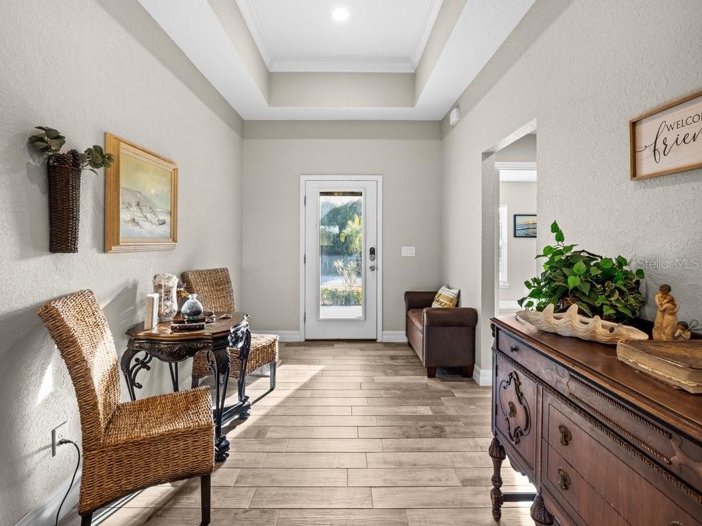 8221 Agate Street Port Charlotte, FL 33981 - Photo 18 of 50 a view of a workspace with furniture and a window