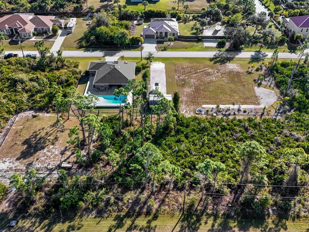 8221 Agate Street Port Charlotte, FL 33981 - Photo 3 of 50 an aerial view of residential houses with outdoor space and swimming pool