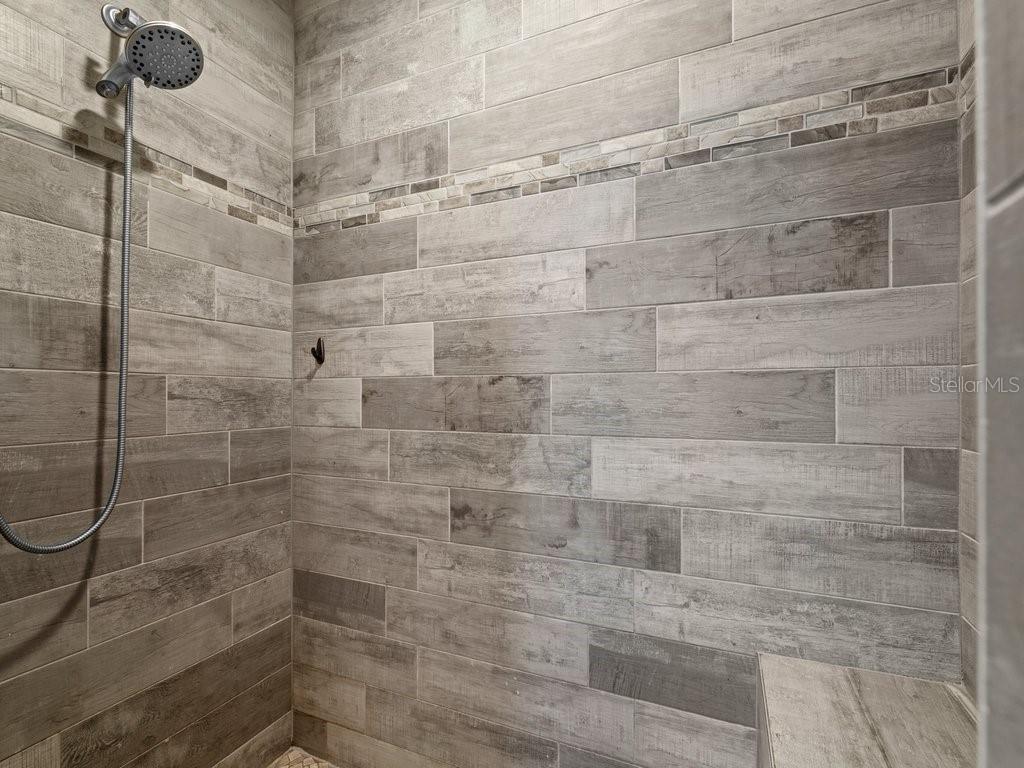 8221 Agate Street Port Charlotte, FL 33981 - Photo 33 of 50 a bathroom with a shower