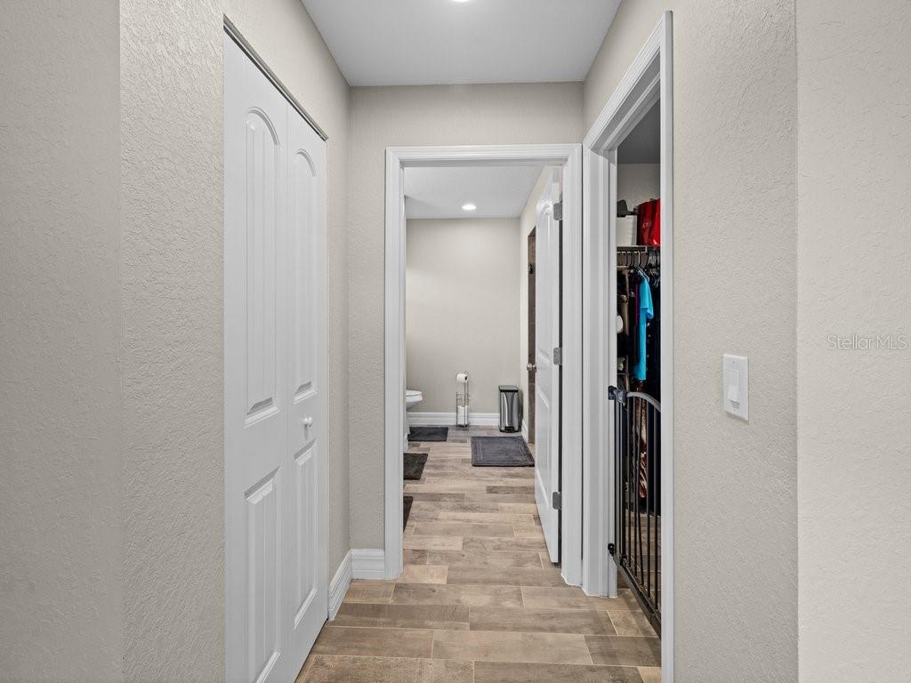 8221 Agate Street Port Charlotte, FL 33981 - Photo 37 of 50 a view of a bathroom from the hallway