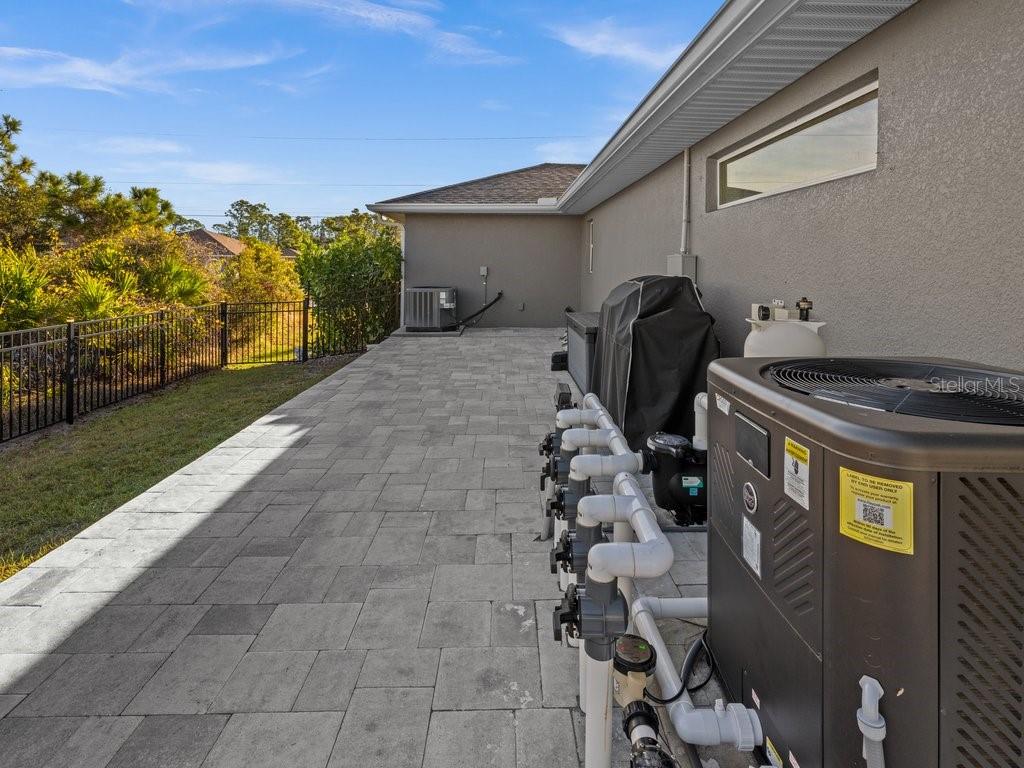8221 Agate Street Port Charlotte, FL 33981 - Photo 42 of 50 a front view of a house with garden