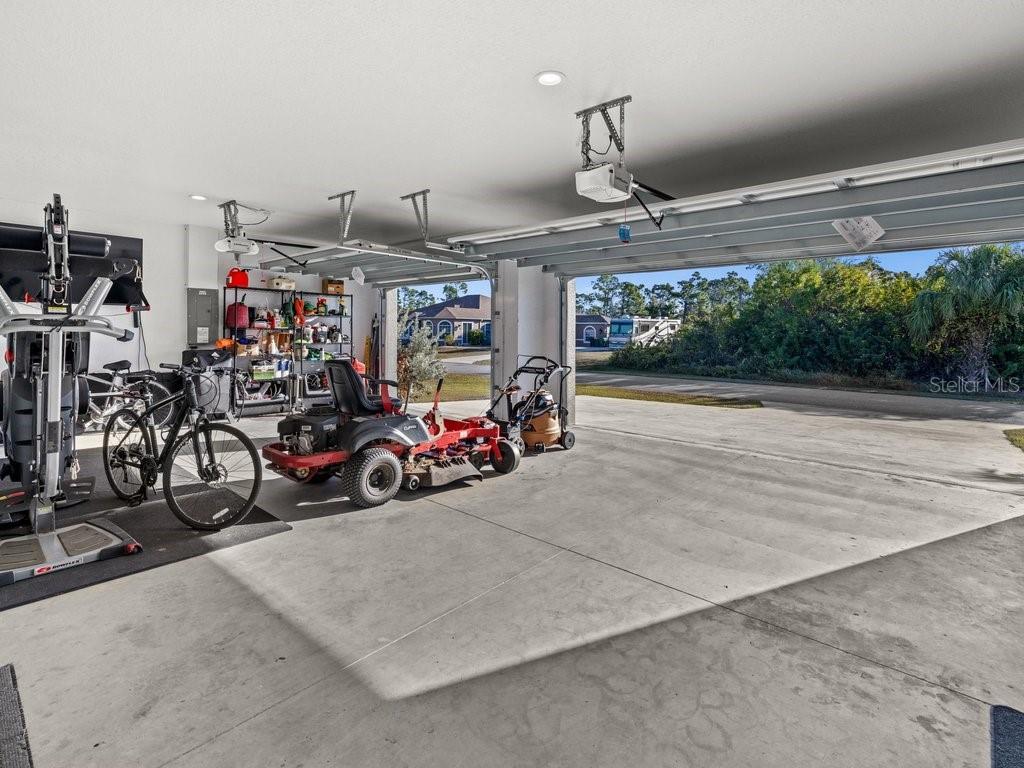 8221 Agate Street Port Charlotte, FL 33981 - Photo 44 of 50 a view of a garage with a bike