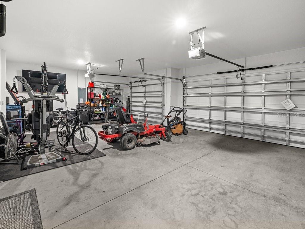 8221 Agate Street Port Charlotte, FL 33981 - Photo 45 of 50 a view of a garage with a bike