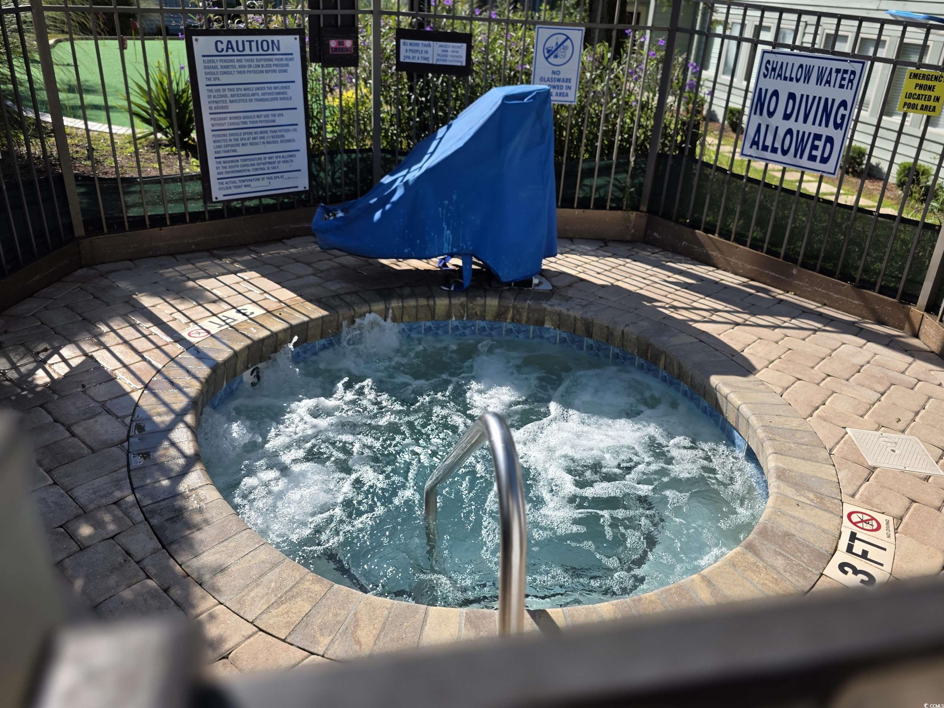 5905 Highway 17 South, Unit 6105 Myrtle Beach, SC 29575 - Photo 16 of 25 View of swimming pool with a community hot tub