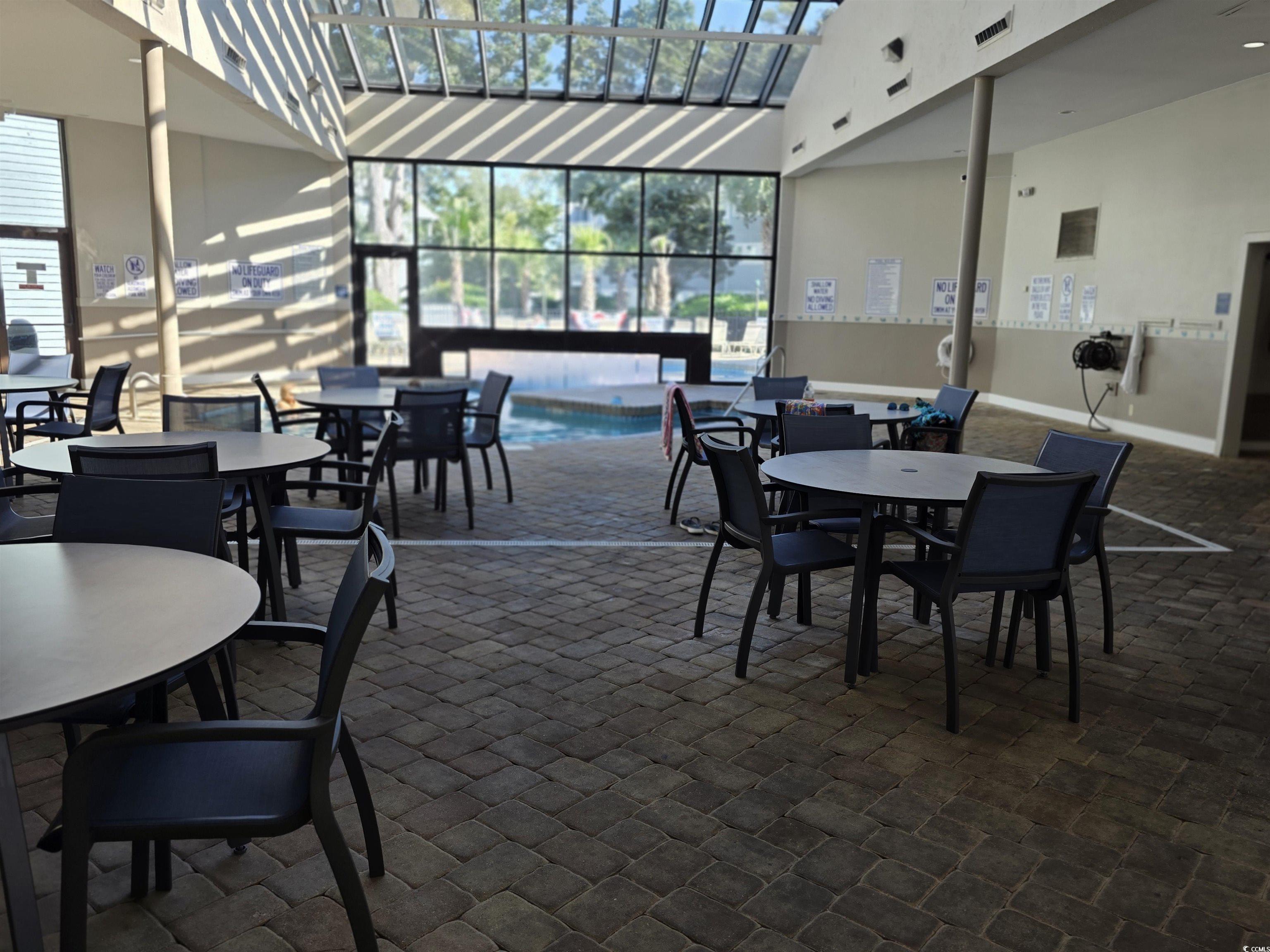 5905 Highway 17 South, Unit 6105 Myrtle Beach, SC 29575 - Photo 17 of 25 Dining area with a high ceiling