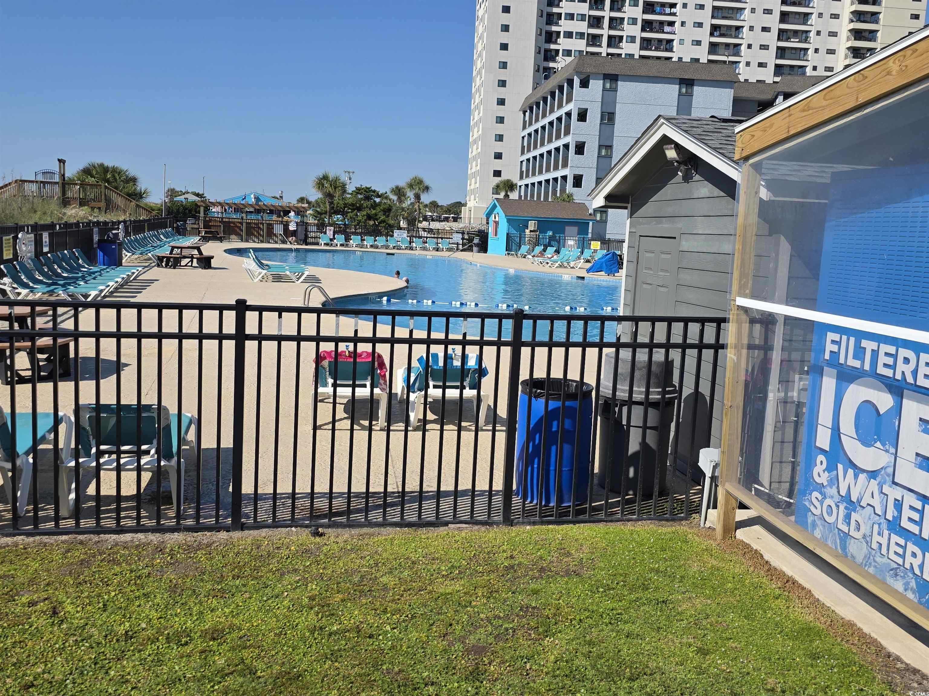 5905 Highway 17 South, Unit 6105 Myrtle Beach, SC 29575 - Photo 21 of 25 Community pool with a patio