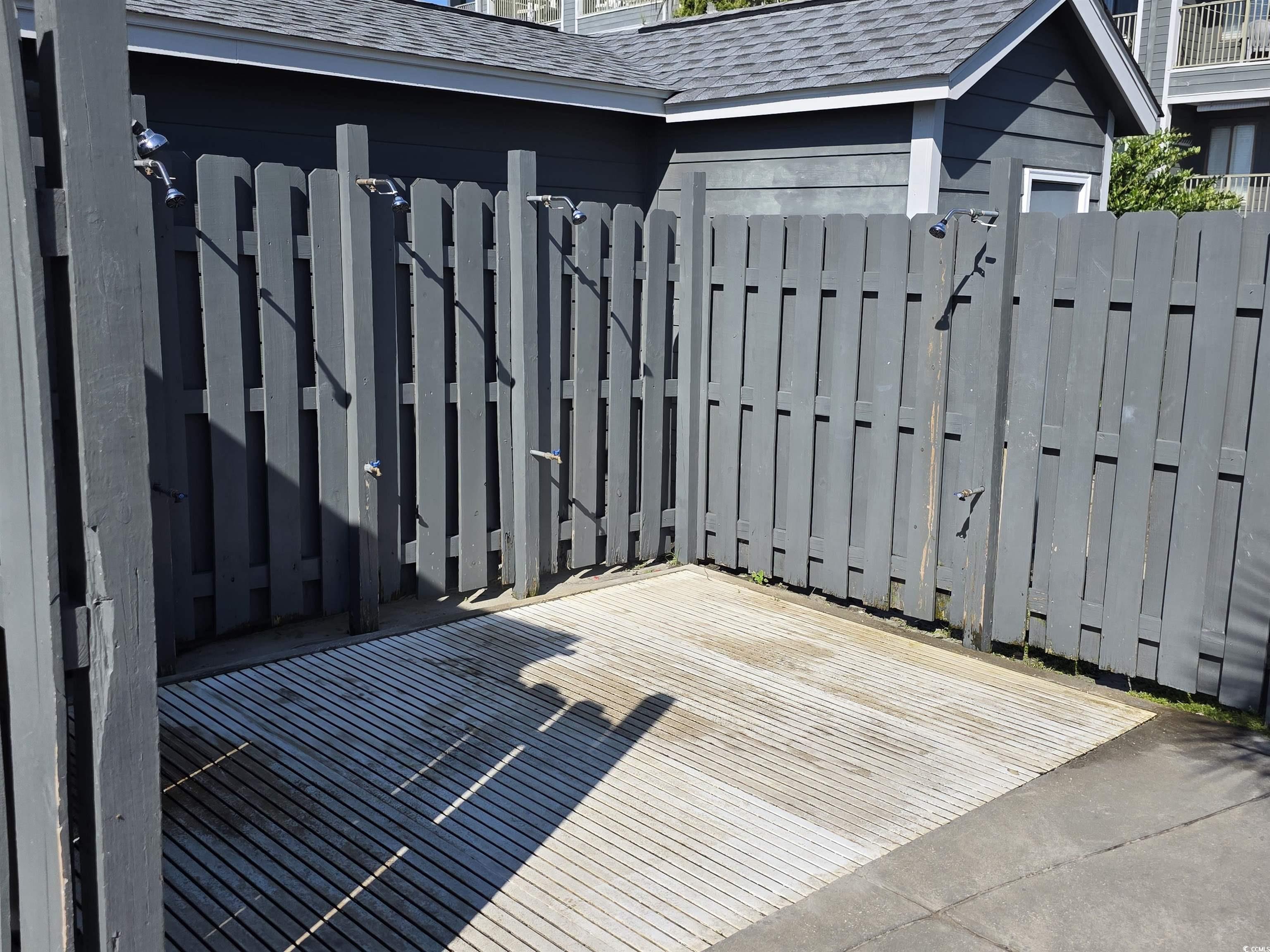 5905 Highway 17 South, Unit 6105 Myrtle Beach, SC 29575 - Photo 23 of 25 Wooden terrace featuring a gate