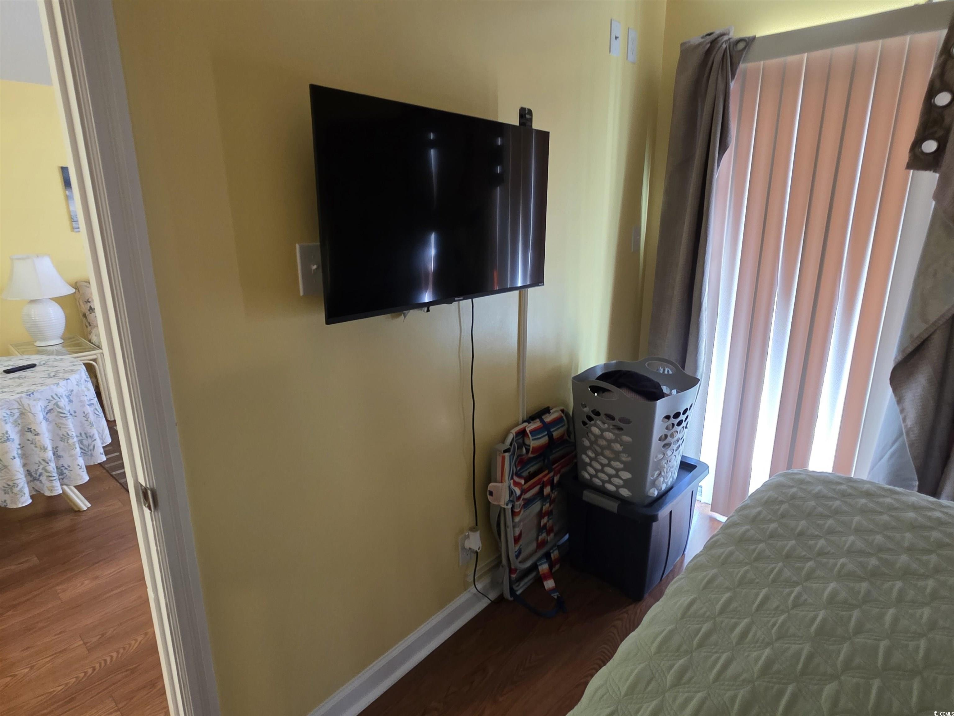 5905 Highway 17 South, Unit 6105 Myrtle Beach, SC 29575 - Photo 9 of 25 Bedroom featuring dark wood-style flooring and baseboards