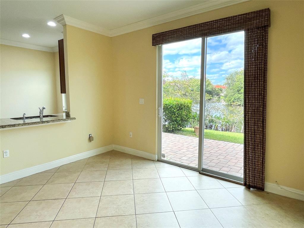 291 Lake Monterey Circle Boynton Beach, FL 33426 - Photo 14 of 47 a view of an empty room and window
