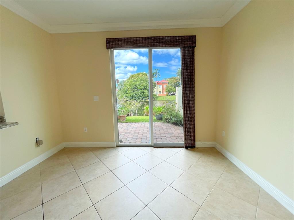 291 Lake Monterey Circle Boynton Beach, FL 33426 - Photo 15 of 47 a view of an empty room with a window