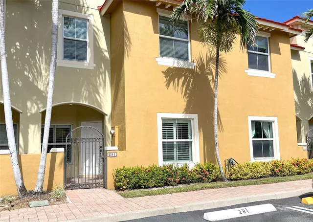 a front view of a house having yard
