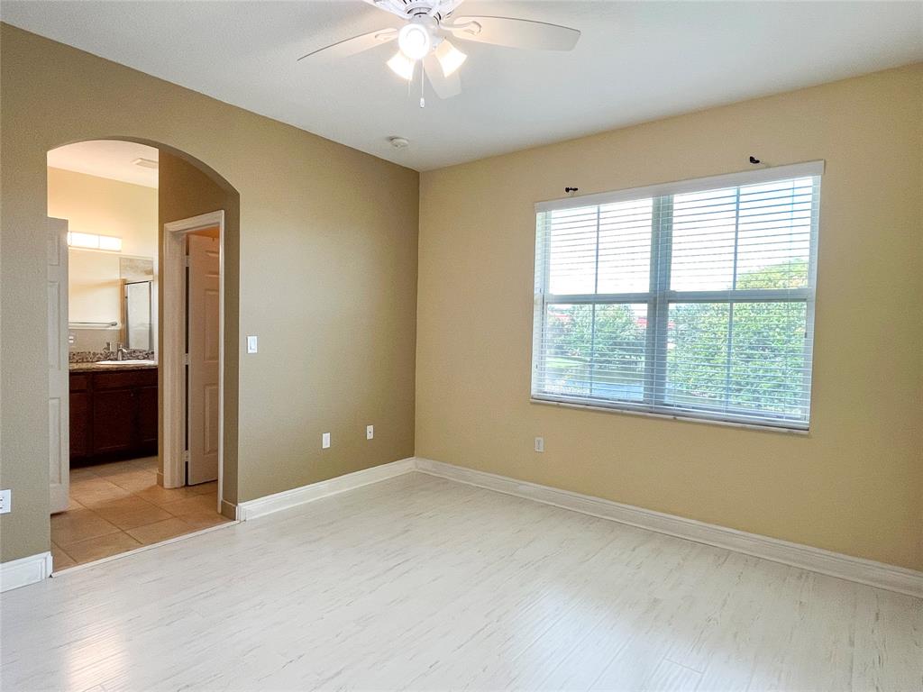 291 Lake Monterey Circle Boynton Beach, FL 33426 - Photo 25 of 47 a view of an empty room with a window