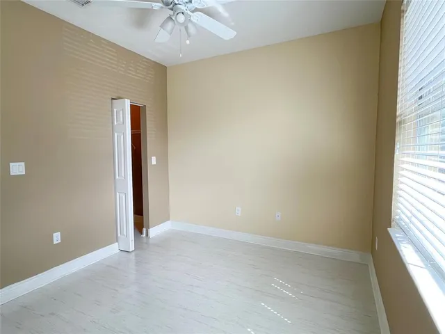an empty room and closet area