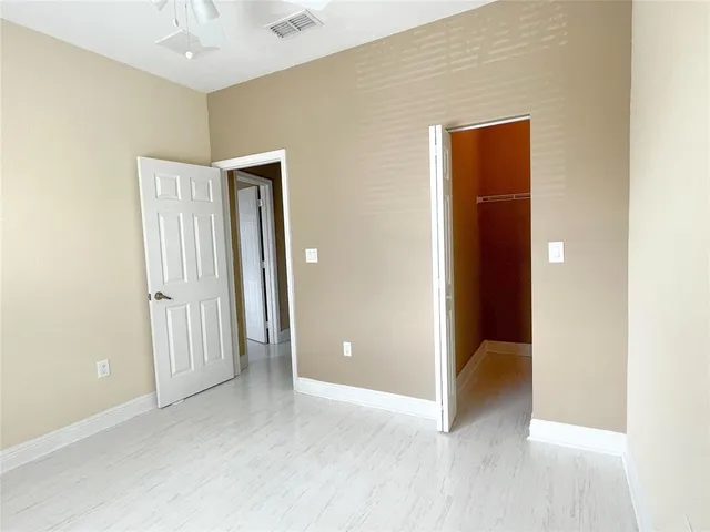 a view of a room with racks on the wall