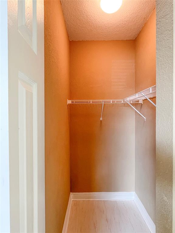 291 Lake Monterey Circle Boynton Beach, FL 33426 - Photo 39 of 47 a view of a room with racks on the wall