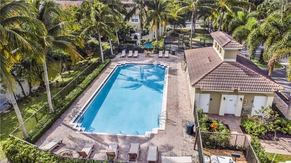 291 Lake Monterey Circle Boynton Beach, FL 33426 - Photo 47 of 47 a view of house with swimming pool outdoor seating