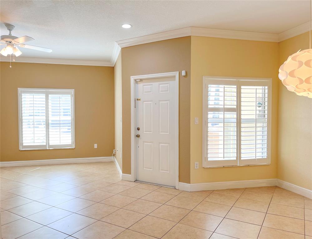 291 Lake Monterey Circle Boynton Beach, FL 33426 - Photo 5 of 47 an empty room with windows