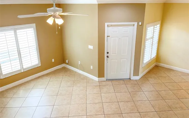 a view of an empty room and window