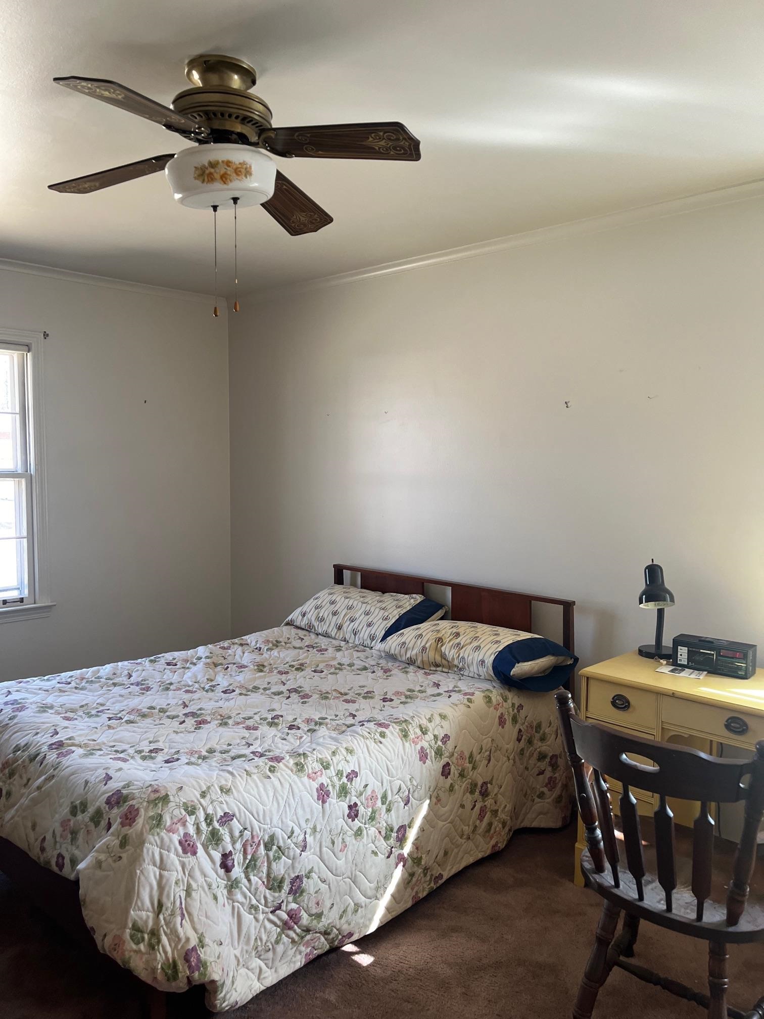 3025 Dumbarton Road Memphis, TN 38128 - Photo 15 of 22 a bedroom with a bed and a table chair