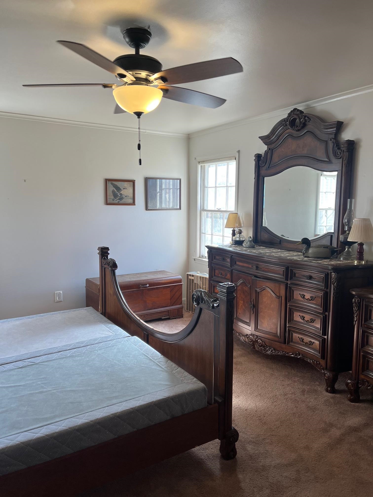3025 Dumbarton Road Memphis, TN 38128 - Photo 18 of 22 a bedroom with a bed and a table