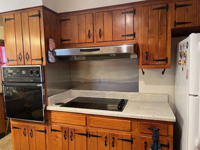 3025 Dumbarton Road Memphis, TN 38128 - Photo 9 of 22 a kitchen with a stove and a refrigerator