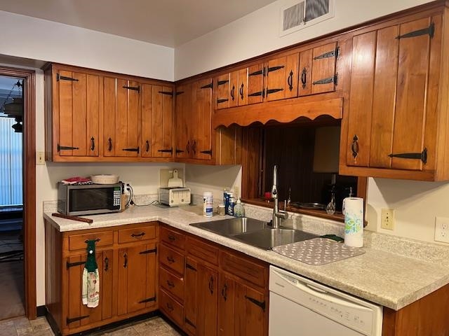 3025 Dumbarton Road Memphis, TN 38128 - Photo 10 of 22 a kitchen with stainless steel appliances granite countertop a sink stove and cabinets