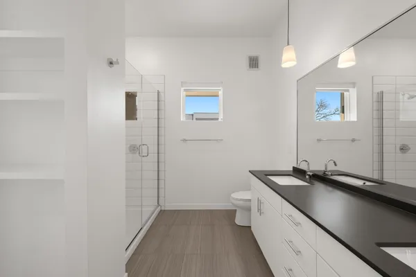 a room with a sink and a mirror