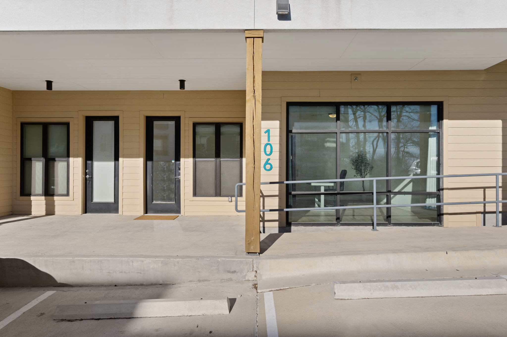 4901 Springdale Road, Unit 106 Austin, TX 78723 - Photo 2 of 40 a view of entrance gate of building
