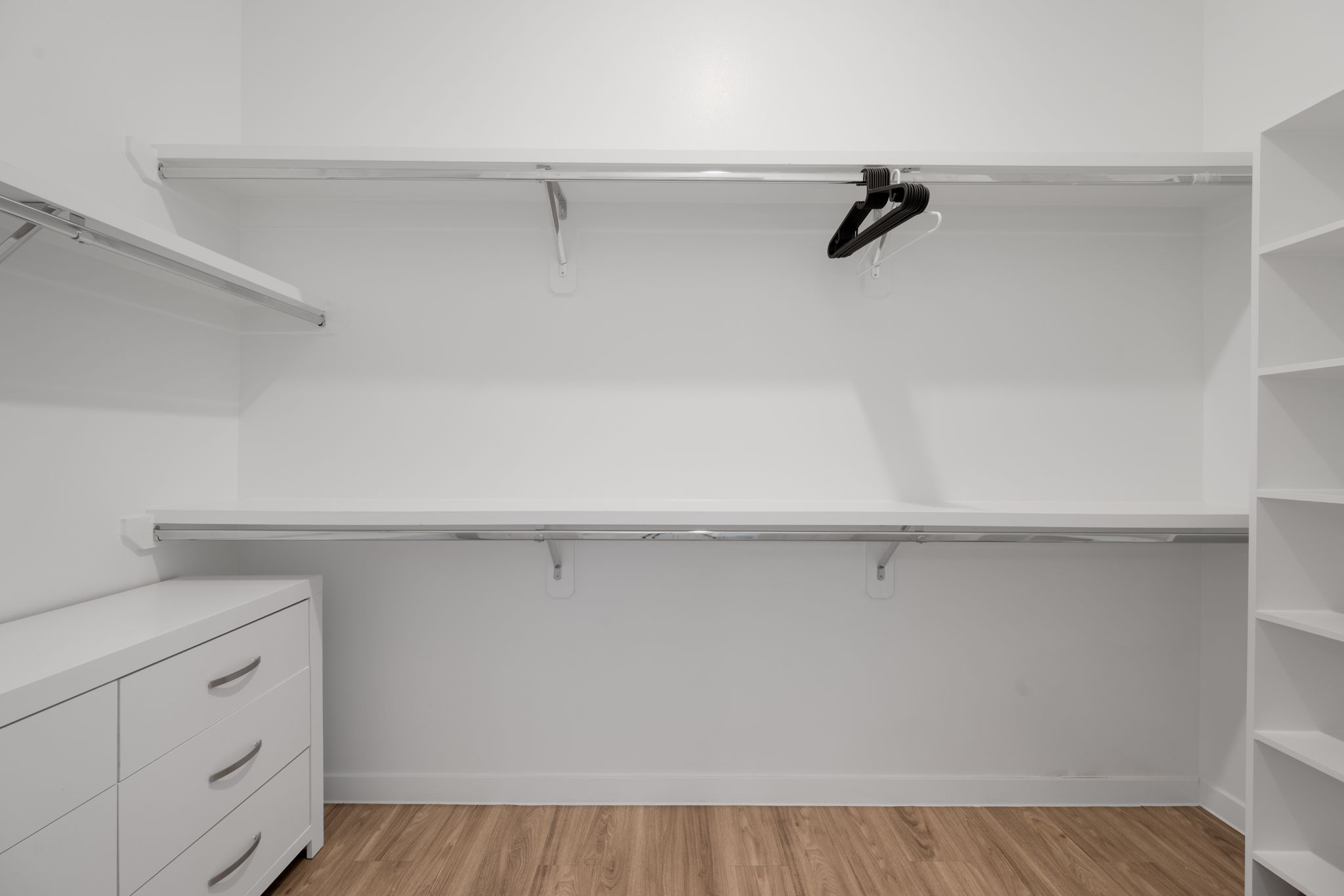 4901 Springdale Road, Unit 106 Austin, TX 78723 - Photo 21 of 40 a view of cabinets with racks on the wall